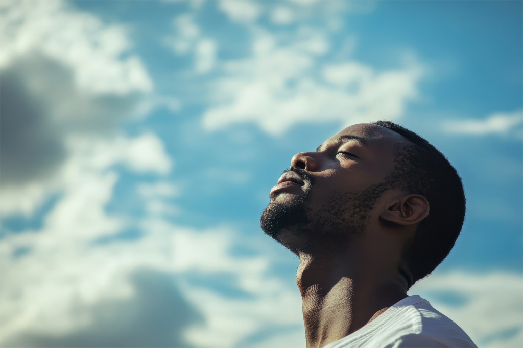 Hopeful Man Looking upward towards the sky